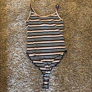 i’m selling a tank top body suit!!